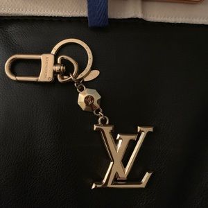 Louis Vuitton Facettes bag charm and key holder.